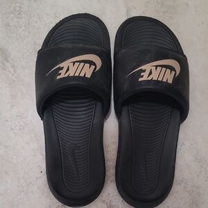 Nike Black and Gold Slide Sandals